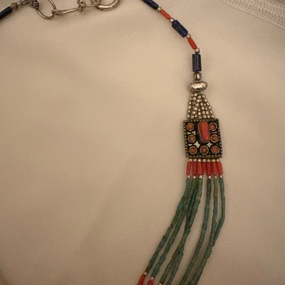 Multicolor Beaded Necklace
Has turquoise and red coral beads
Sterling Silver